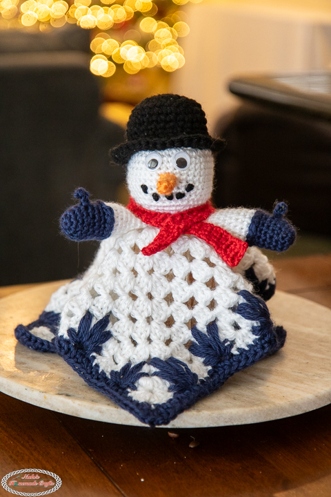 Christmas snowman lovey crochet pattern made using the Extreme Drop Leaf Stitch tutorial